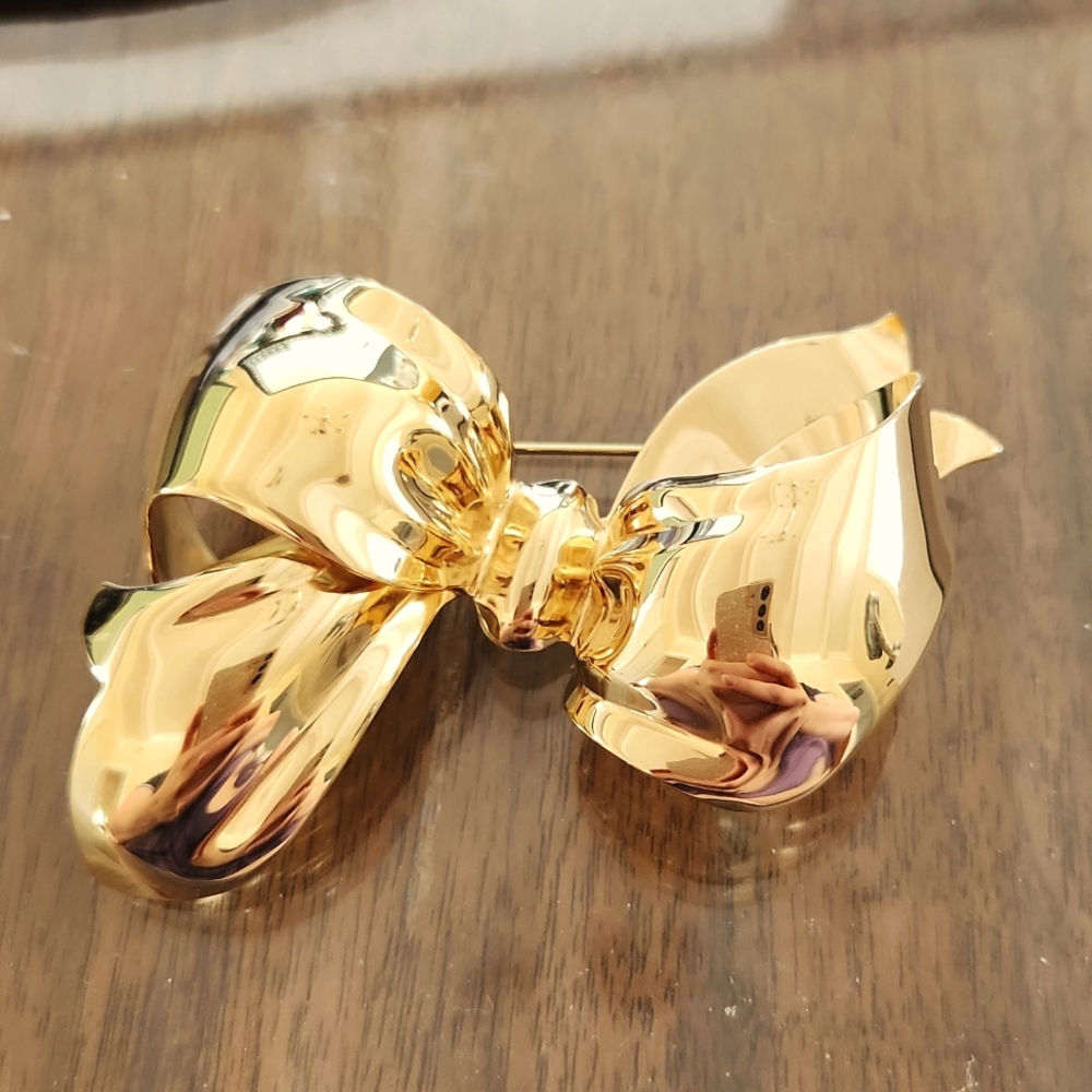 Vintage Monet Gold Tone Bow Pin